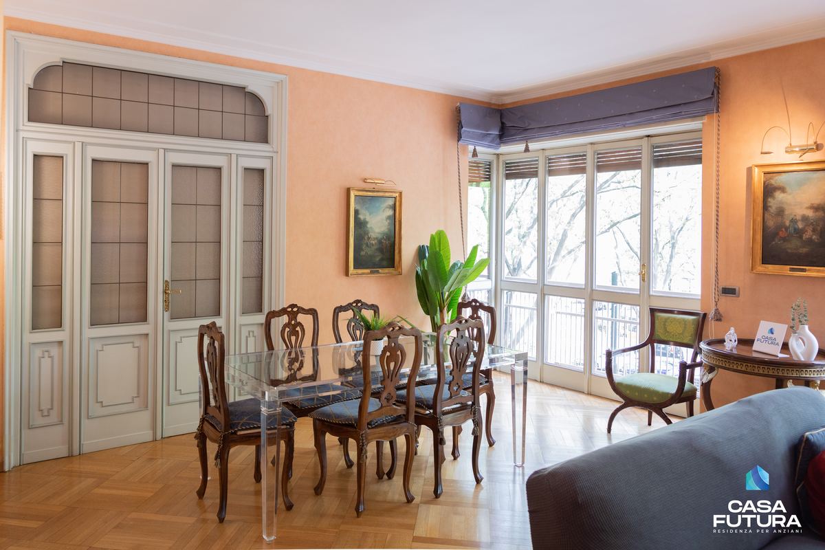 Casa Futura Corso Einaudi 49, Torino: soggiorno con sala da pranzo